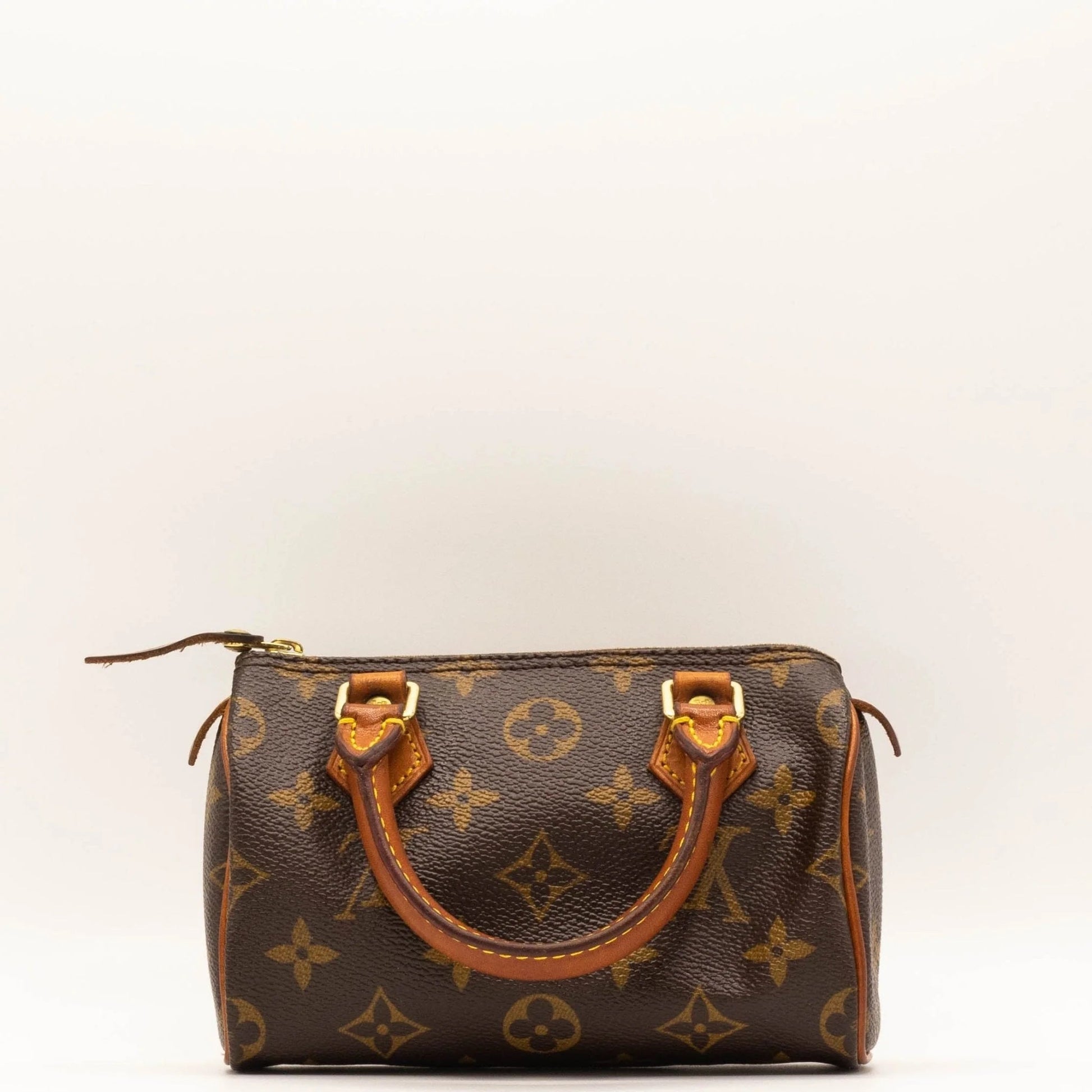Sac Louis Vuitton Speedy Nano en toile Monogram, sac de luxe d’occasion authentique disponible chez Sorayae