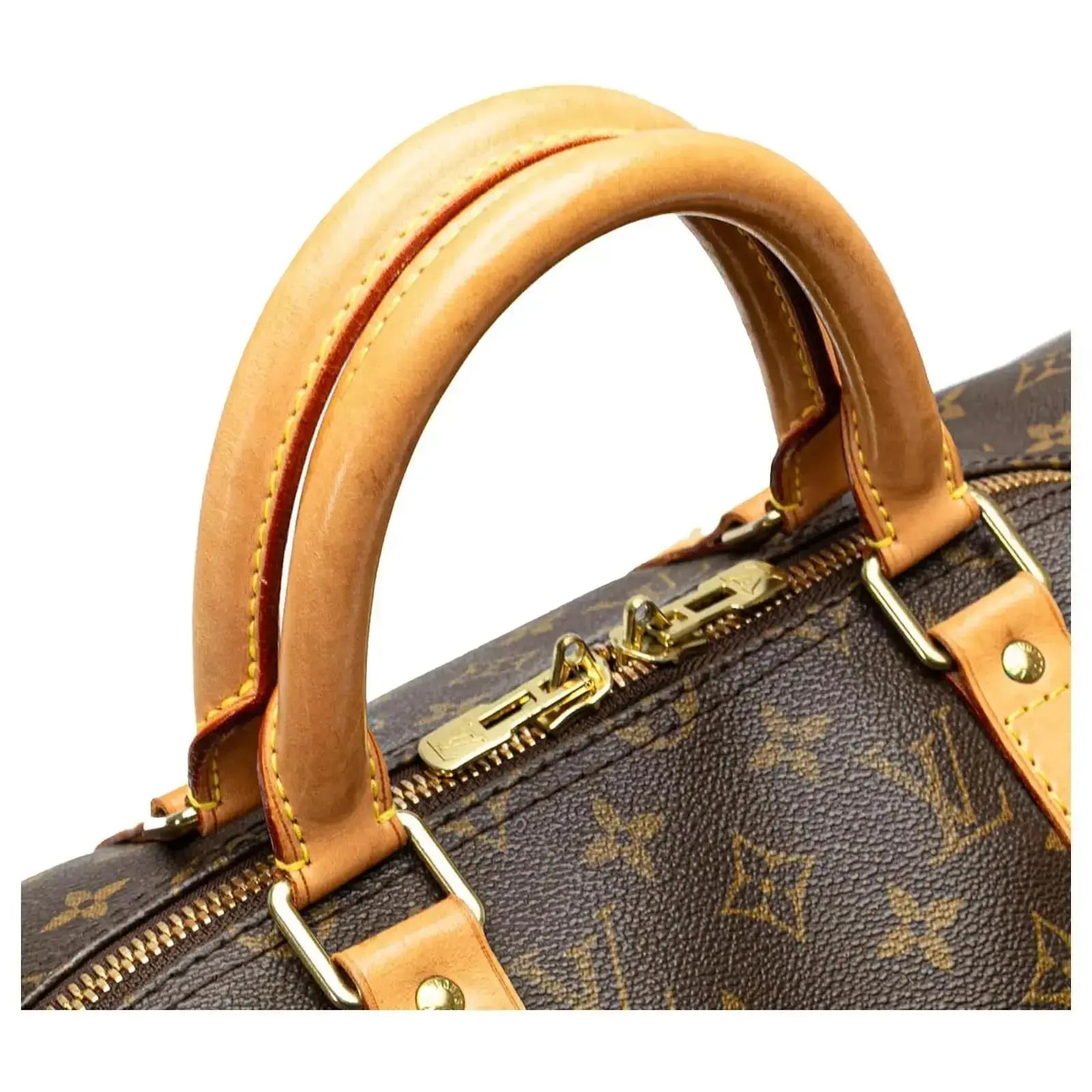 Sac de voyage Louis Vuitton Keepall 55 en toile Monogram, sac de luxe d’occasion authentique disponible chez Sorayae